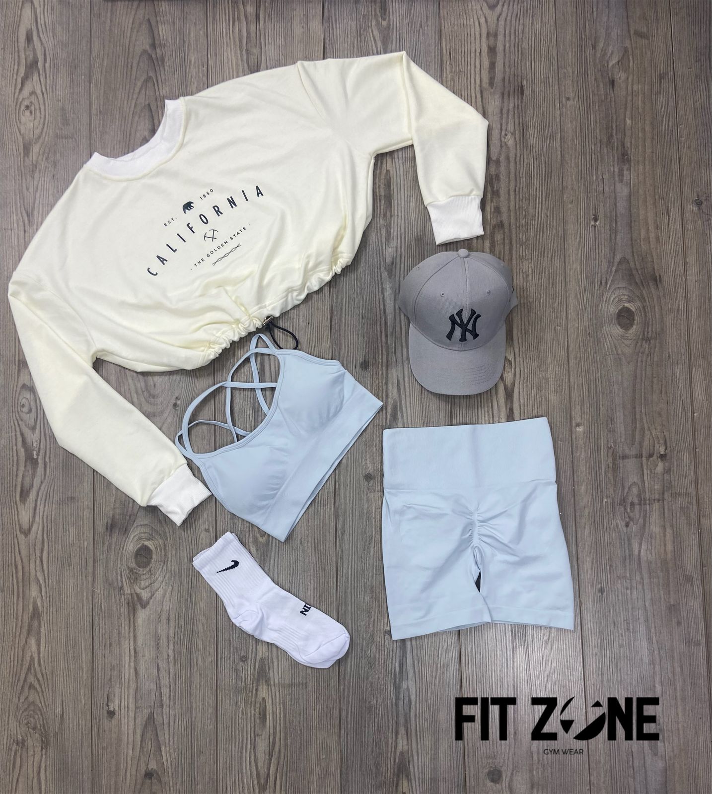 TOTAL LOOK BUZO Y SET CORTO